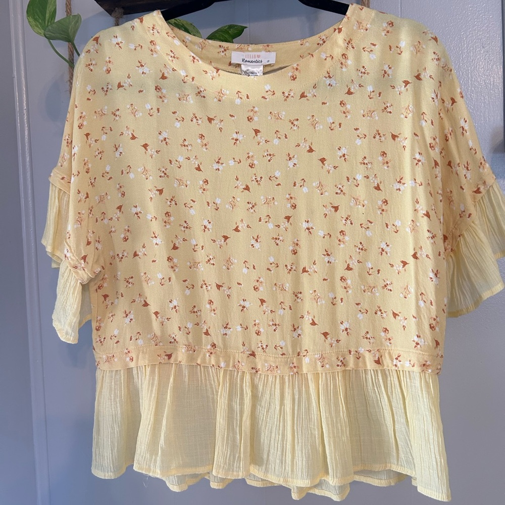 Yellow blouse with floral detail and flowy bottom and sleeves